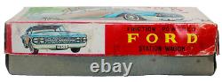 Scarce Japanese Tin Friction 1960's Ford Country Squire Station Wagon with Box